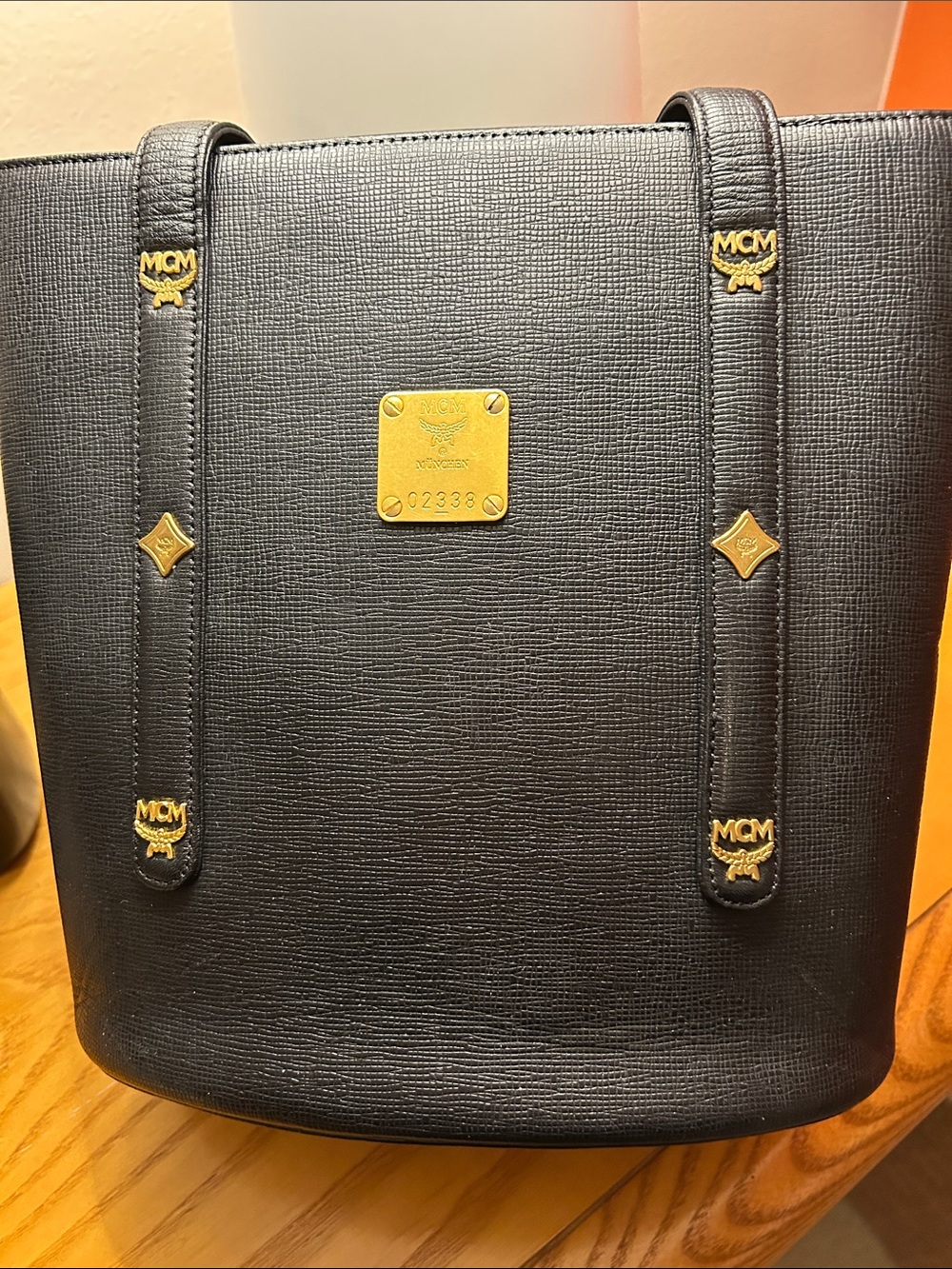 MCM Black Leather Tote with Gold Logo Accents  9.5” tall x 10.5” wide